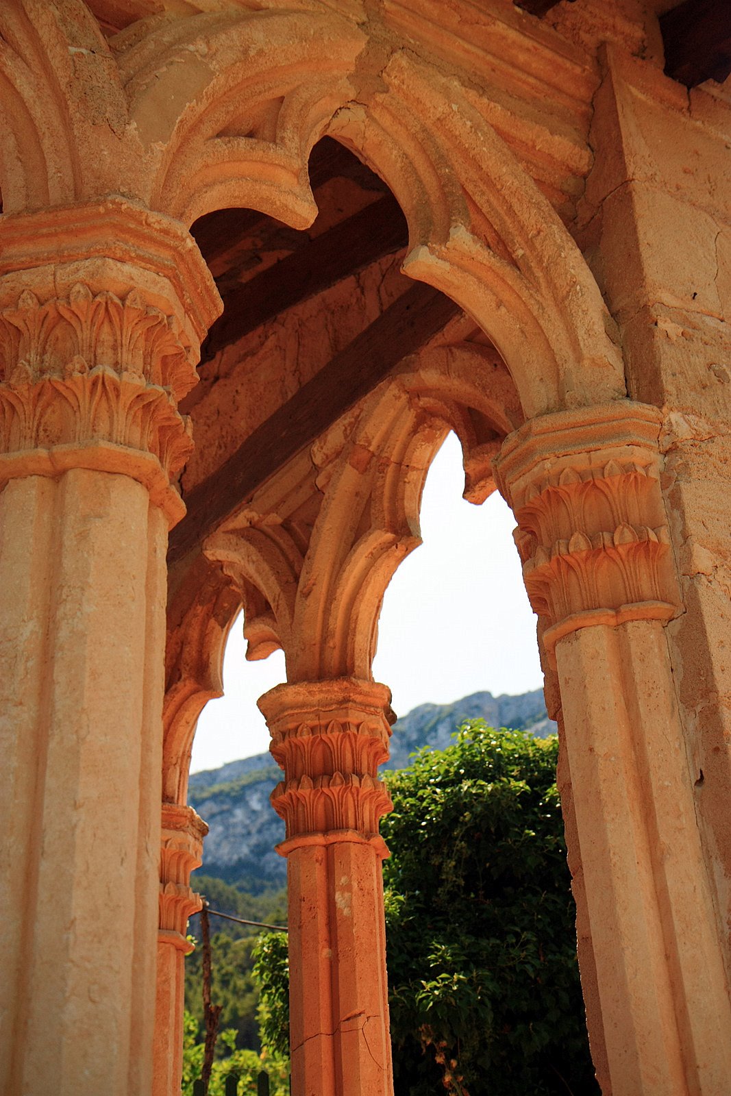 The rusty sandstone pillars of the Miramar Monastery easily make it one of the most beautiful houses and gardens in Majorca